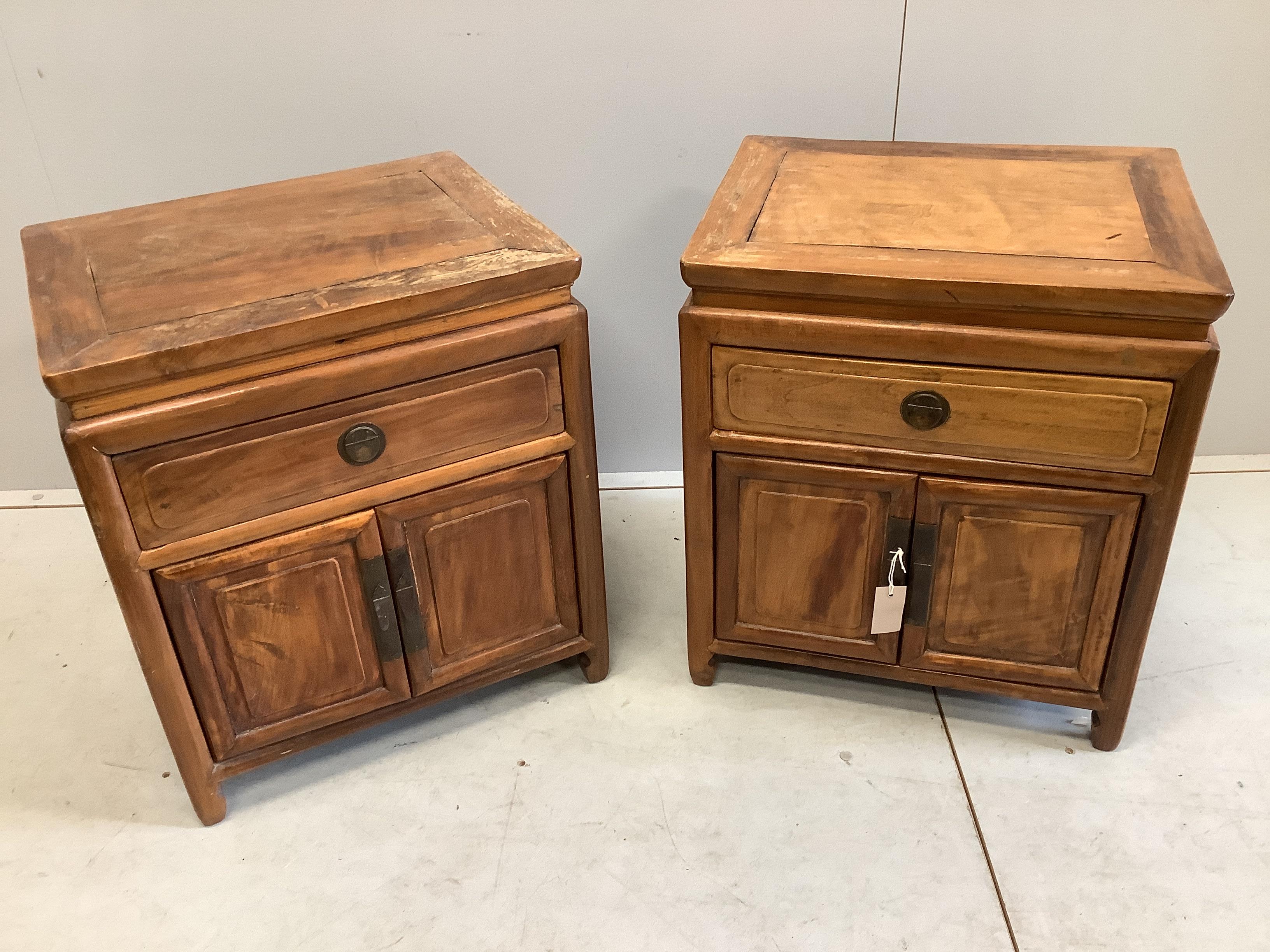 A pair of Chinese pine bedside cabinets, width 53cm, depth 43cm, height 60cm